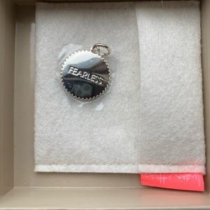 Pendant new in the box by India Hicks. Silver plated